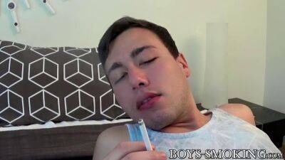 Young stud smokes while jerking off solo - sunporno.com