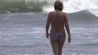 58-YEAR-OLD HAIRY MOTHER IS SHOWN IN BIKINI ON THE BEACH - sunporno.com