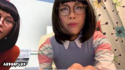 Nerdy Asian girls, Velma and Dr. Fujita are posing and teasing in front of the camera - sunporno.com