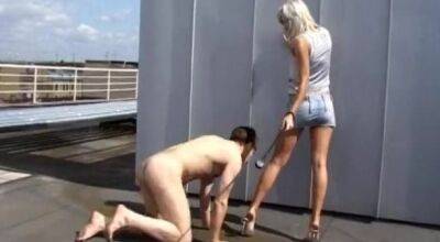 Slave flogged and shoes dominated on the rooftop - sunporno.com - Russia