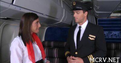 Sexy stewardess in pantyhose seduced by a pilot in airplane - sunporno.com