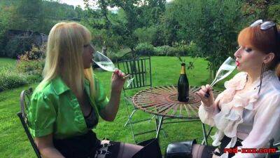 Busty Blonde - Redhead British mature Red and her hot busty blonde girlfriend are outside enjoying a bottle of wine. Next thing you know, Red has her face deep in her girlfriends cunt! - sunporno.com - Britain