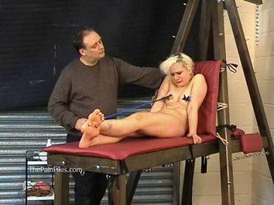 Busty blonde is punished with hot wax and hard spanking - bdsm.one